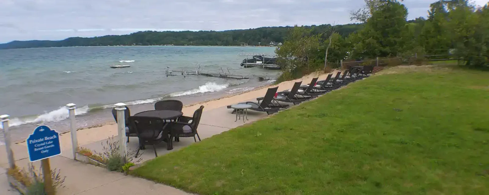 Private beach and dock on Crystal Lake